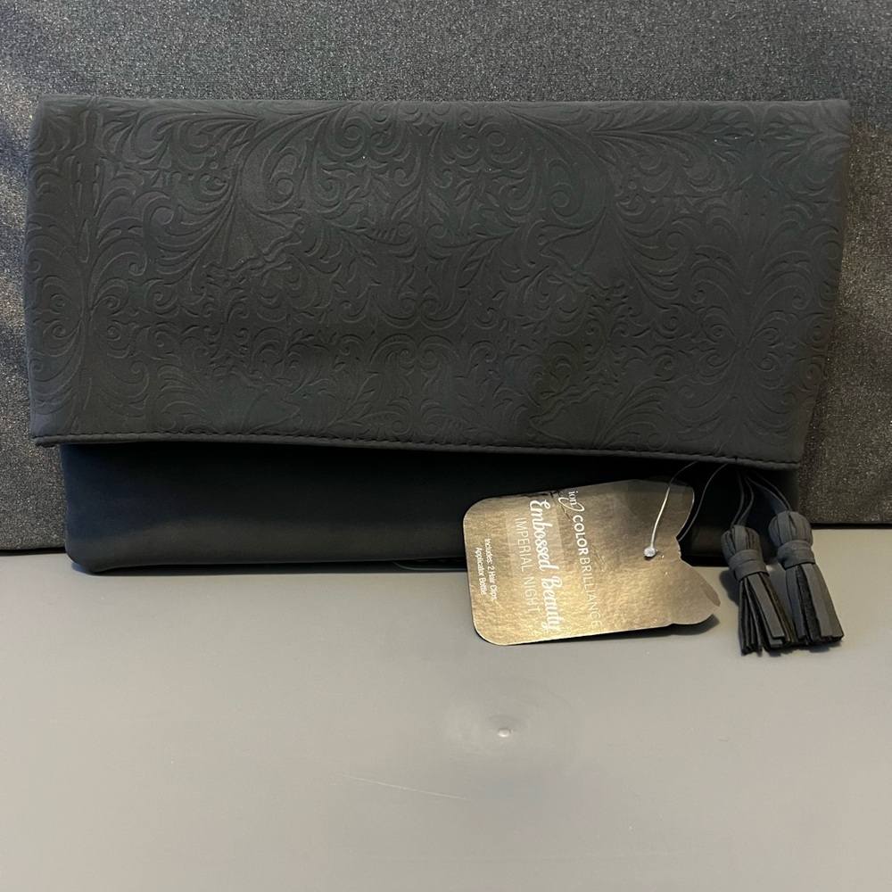 Elegant Black Clutch with Tassel Detail